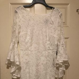 White lace dress with bell sleeves